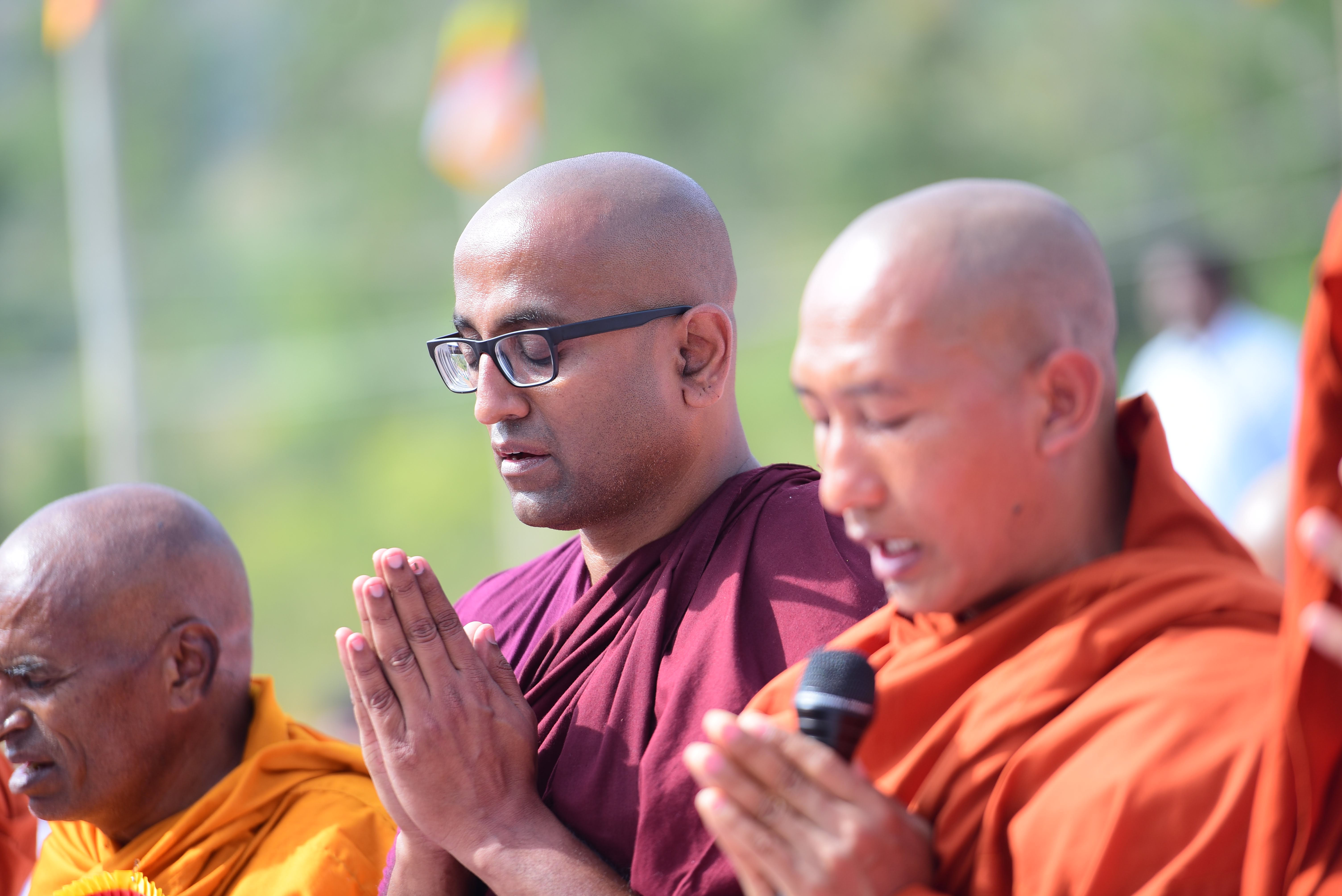 IBMCT monks in prayer during a community gathering